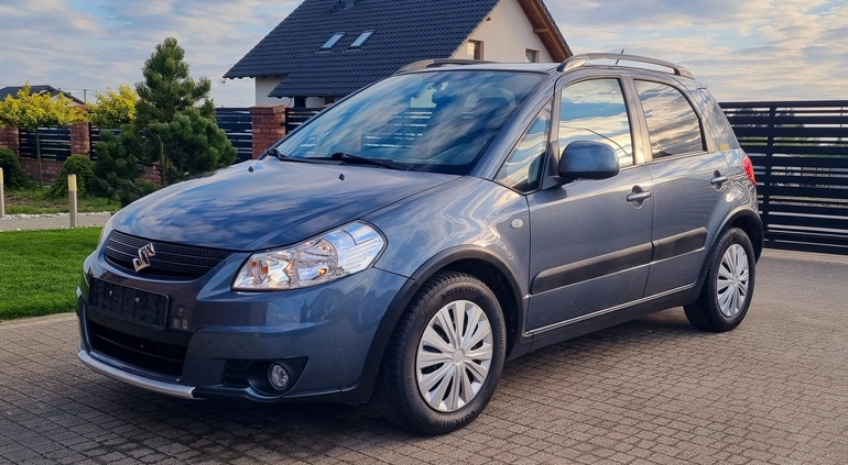 Suzuki SX4 cena 24900 przebieg: 152000, rok produkcji 2009 z Tuchola małe 407